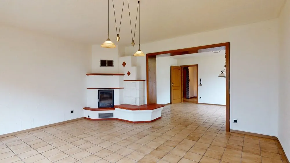 Immobilienangebot - Werl - Häuser - Zweifamilienhaus mit Kaminofen und 2 Garagen in Werl-Westönnen zu verkaufen