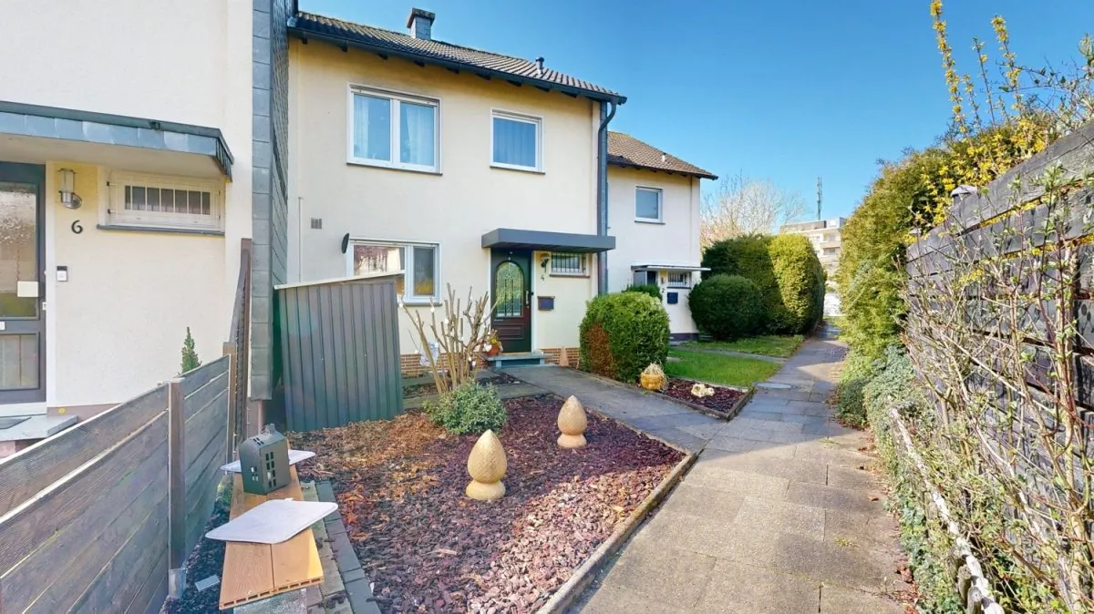 Immobilienangebot - Hamm - Häuser - Reihenmittelhaus mit Garten und zwei Garagen für Familien in Hamm-Rhynern
