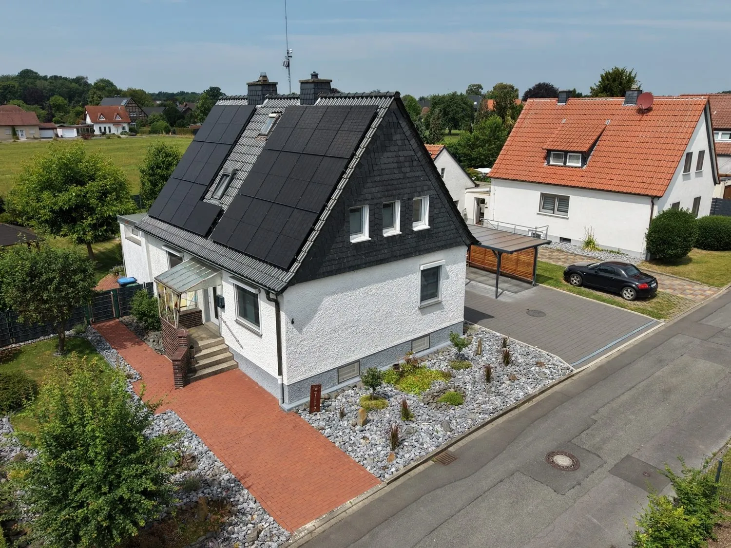 Immobilienangebot - Welver - Häuser - Provisionsfrei für Käufer: Einfamilienhaus mit Garten, Garage und PV-Anlage in Welver-Scheidingen