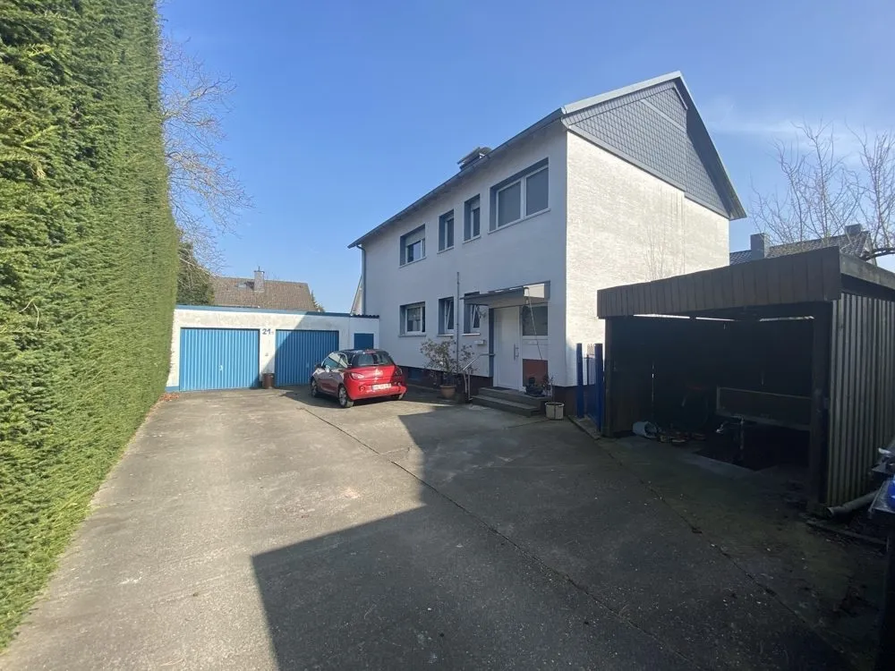 Immobilienangebot - Hamm - Häuser - Zweifamilienhaus mit Doppel-Garage und Carport