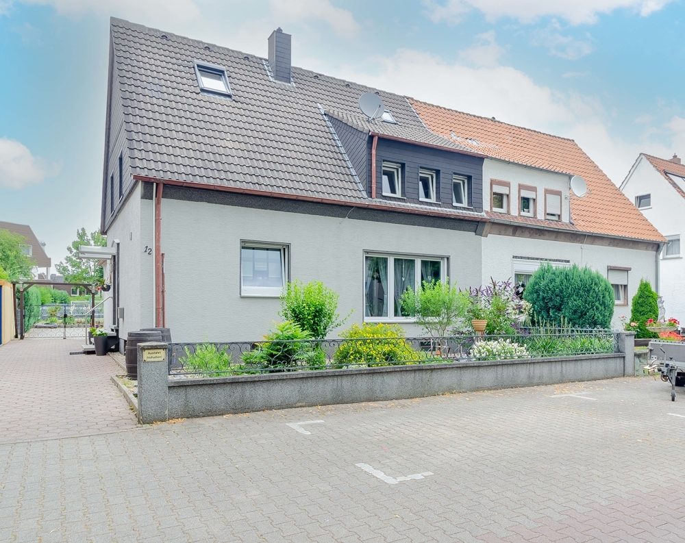 Immobilienangebot - Bönen - Häuser - Modernisiertes Kleinod in ruhiger Lage - 4 Garagen und viel Zukunft voraus!